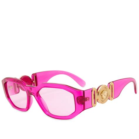 versace pink cap|Versace pink sunglasses.